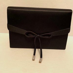Black formal purse  Black  Hand-held or corded attached shoulder strap
